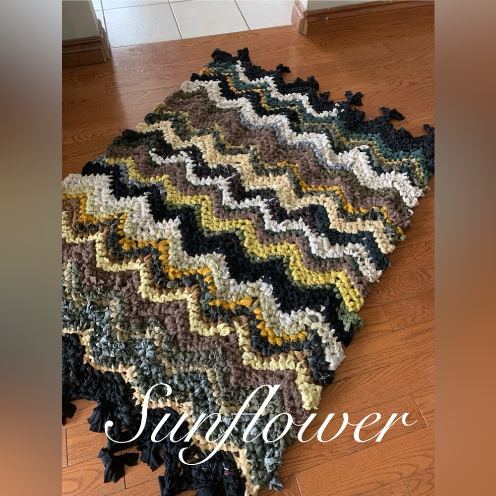 Beautiful handmade crochet rug. Made with recycled fabric. One of a kind